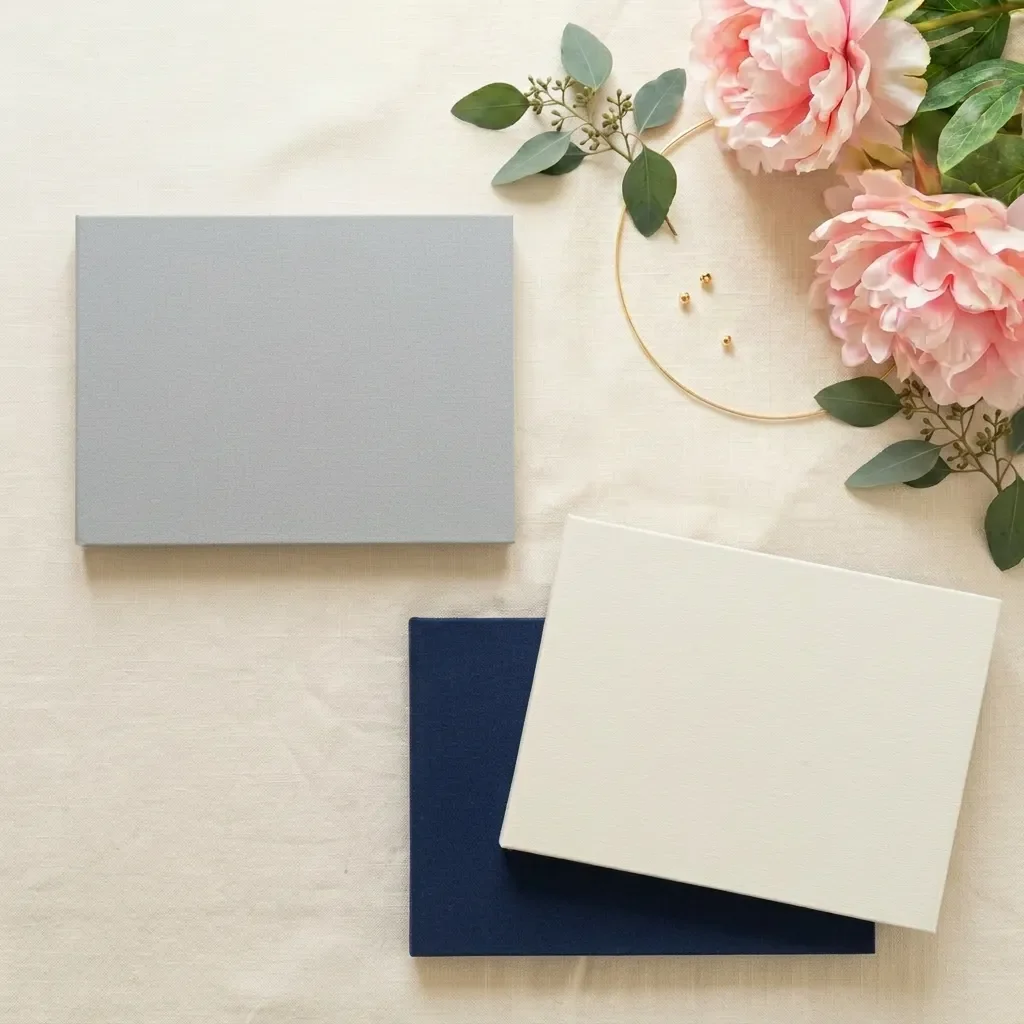 Grijs, creme en blauw videoboek oud model
